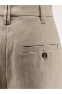 Beige textured twill cotton and linen shorts by Brunello Cucinelli with dark button and zipper detail