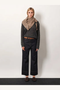 Brunello Cucinelli women’s grey wool blend sweater with a taupe knitted scarf draped over shoulders and loosely knotted