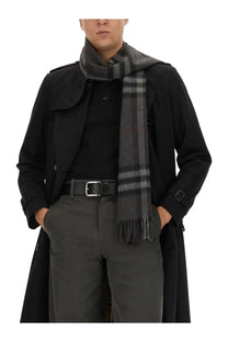 Burberry men’s cashmere check scarf in black with gray and black checkered wool pattern worn draped around neck