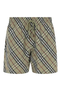 Burberry men’s check swimsuit in beige and black plaid with drawstring waistband for swimwear use