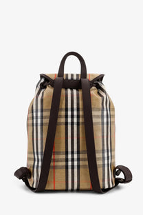 Burberry men’s Highlands beige and black plaid coated canvas backpack with brown leather straps and top handle