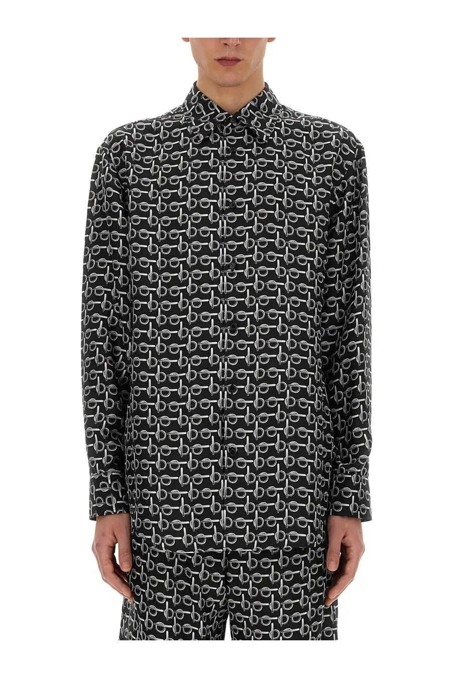 Burberry men’s black long-sleeved button-up shirt with repeating white chain-link pattern in cotton fabric