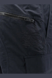 Black arcteryx nylon pants with a subtle embroidered logo on the thigh in a burberry mens sidcot nylon trousers blue product