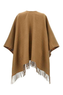 Burberry women’s reversible check wool cape beige with tan wool exterior and fringed hem showing back side
