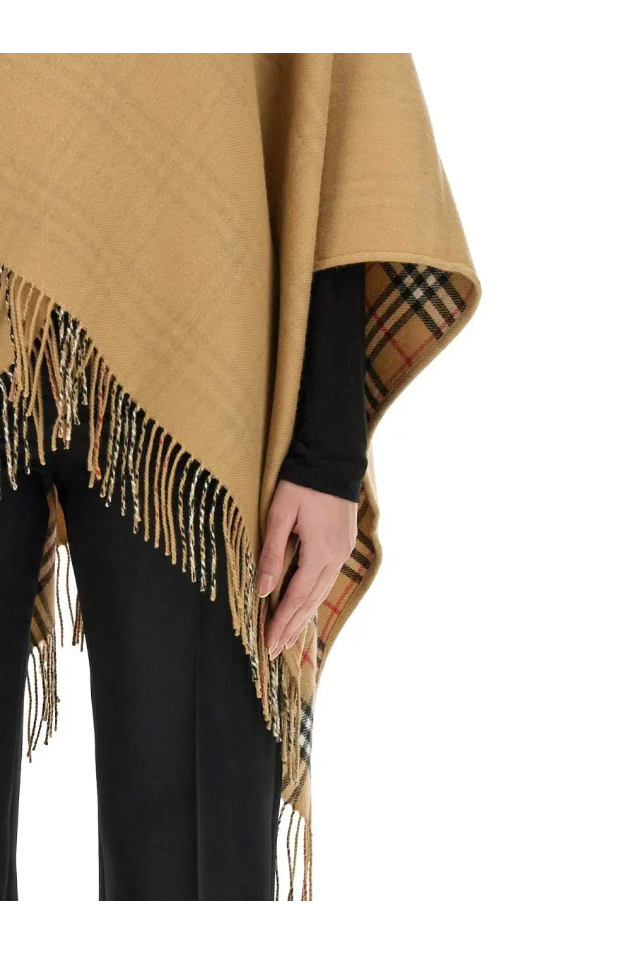 Beige woolen reversible Burberry women’s cape with fringed edges and classic check pattern inner lining