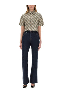 Burberry women’s straight jeans in dark blue denim featuring a flare design for stylish casual wear
