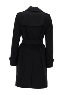 Burberry women’s black trench doppiopetto Kensington with structured collar belted waist and epaulets in classic design
