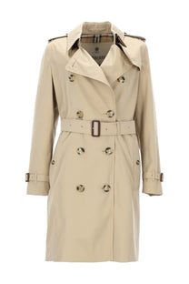 Burberry women’s trench heritage Kensington beige trench coat with belted waist silver buttons and military-style epaulets