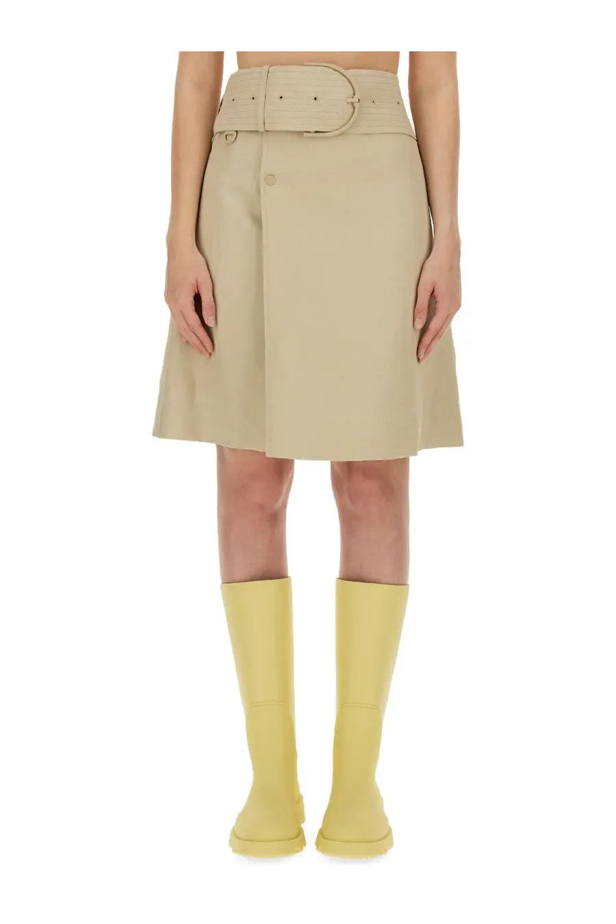 Beige pleated burberry women’s trench skirt with matching belt and button closure in lightweight fabric