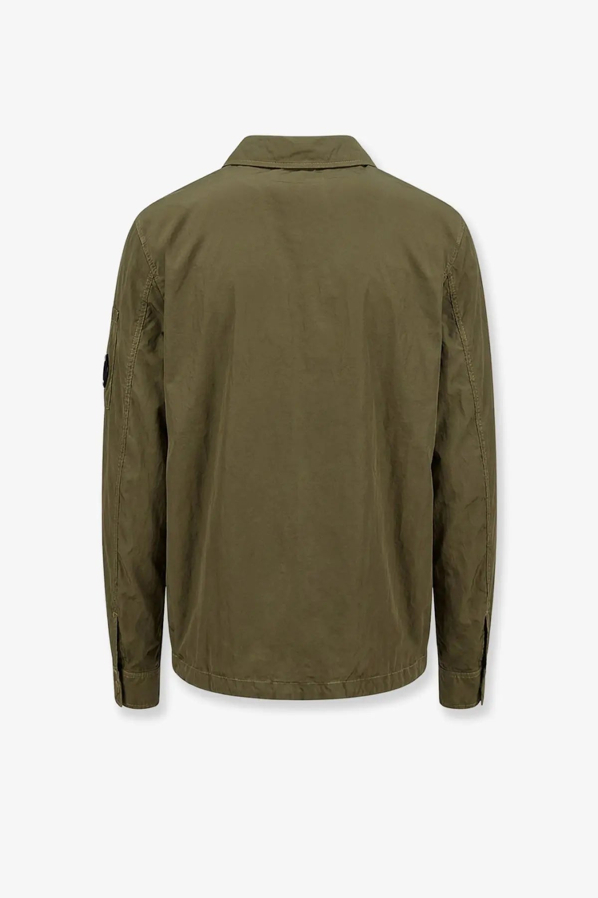 Olive green nylon shirt jacket by c.p. company with subtle texture and reinforced seams for durability