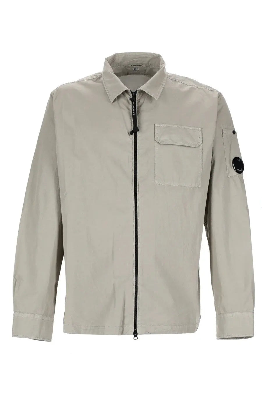 C.p. company men’s overshirt con zip grey beige long-sleeved utility jacket with black zipper and logo patch on sleeve