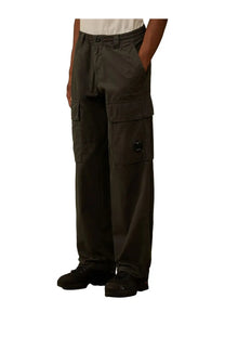 C.P. Company men’s pantalone cargo pants in contone green with multiple flap pockets and black button detail on thigh