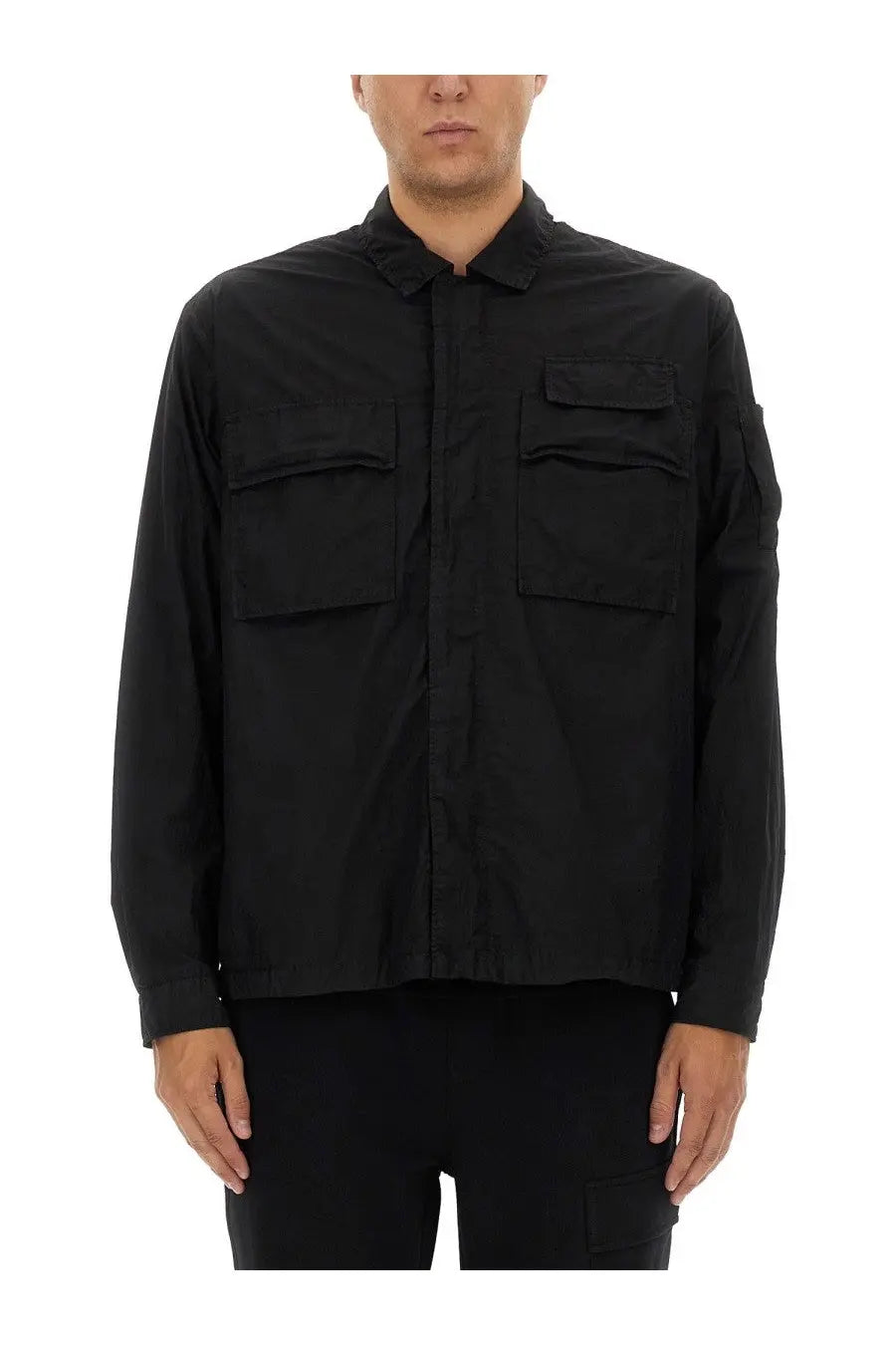 C.P. Company men’s black long-sleeved utility shirt with collar and two chest pockets in durable fabric