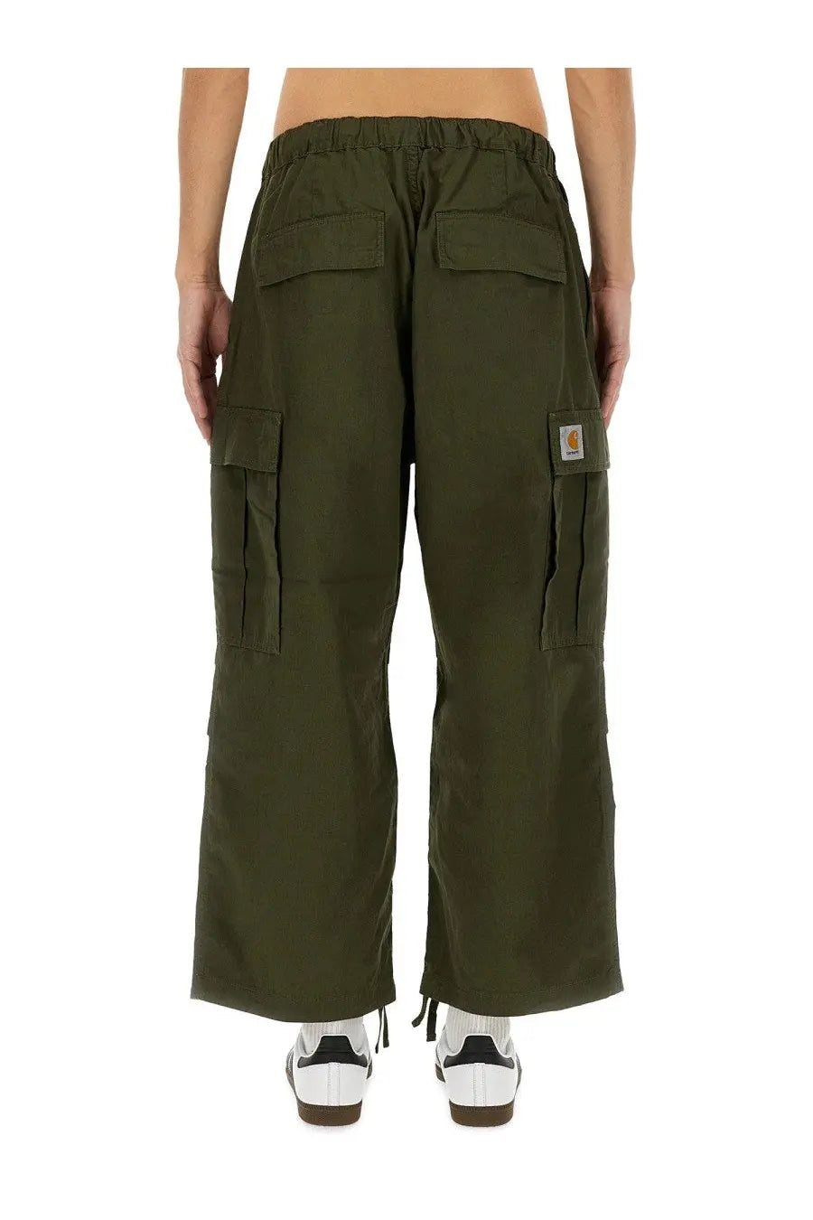 Carhartt wip men’s olive green cargo pants with multiple pockets and elastic waistband made from durable fabric
