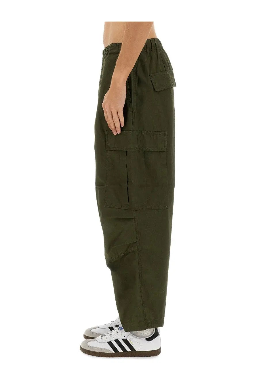 Carhartt Wip men’s olive green cargo pants with multiple pockets and relaxed fit made from durable fabric
