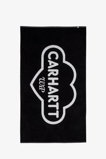 Black Carhartt Wip men’s cotton beach towel featuring a bold white cloud-shaped logo in the center