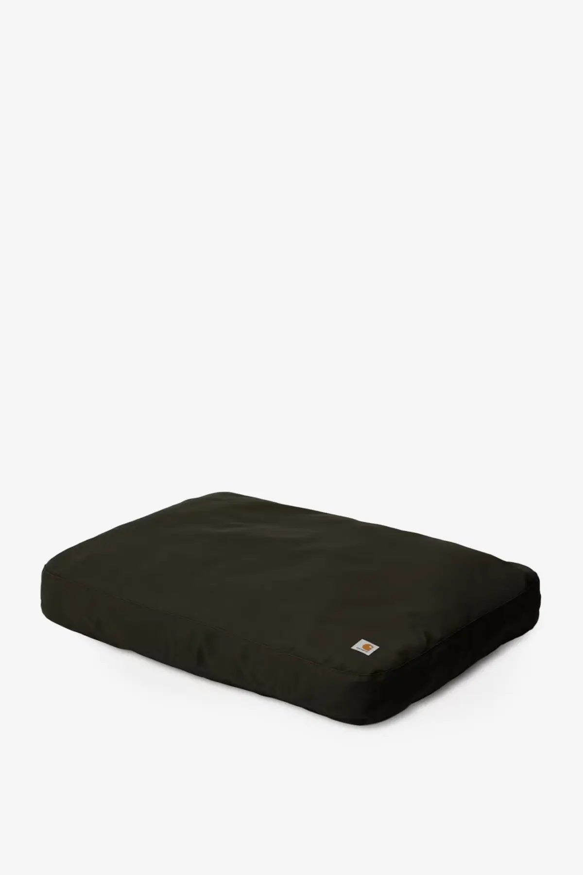 Black rectangular carhartt wip men’s dog bed with plush fabric and canvas cushion in green with logo tag