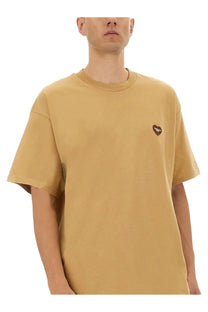 Carhartt Wip men’s beige oversized crew-neck t-shirt with embroidered brown heart logo on left chest