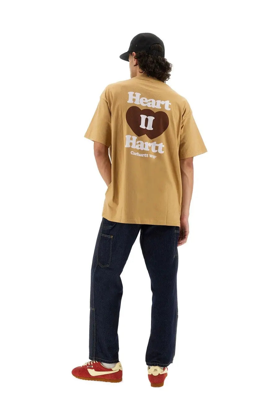 Back side of carhartt wip men’s beige short-sleeved shirt with brown heart graphic and white heart ii hart text