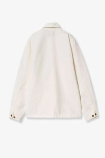 Cream-colored carhartt wip men’s michigan cotton denim jacket wax with classic collar and buttoned cuffs long sleeves
