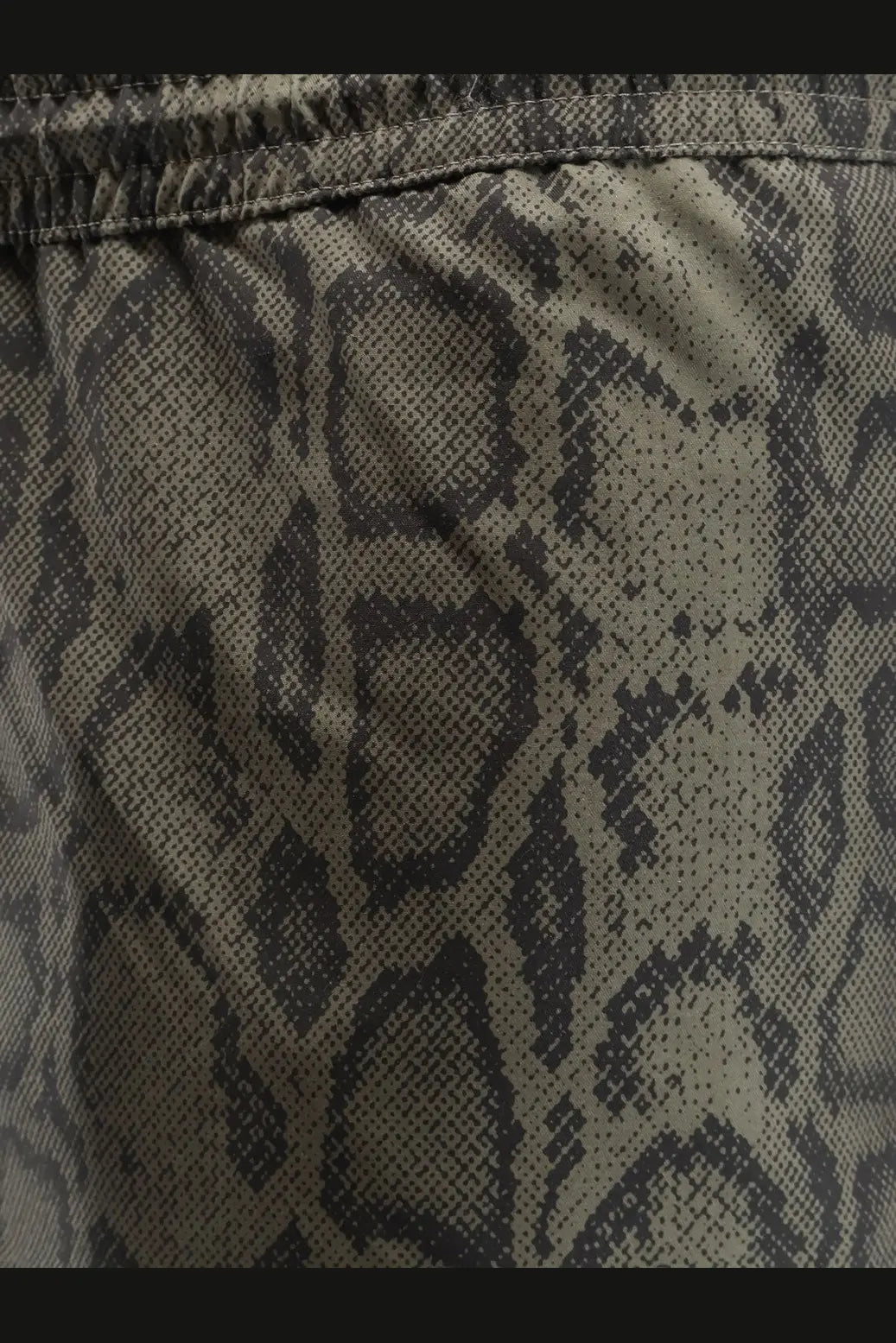 Carhartt wip men’s olive green and black snake print nylon swim boxer shorts shown from the back side