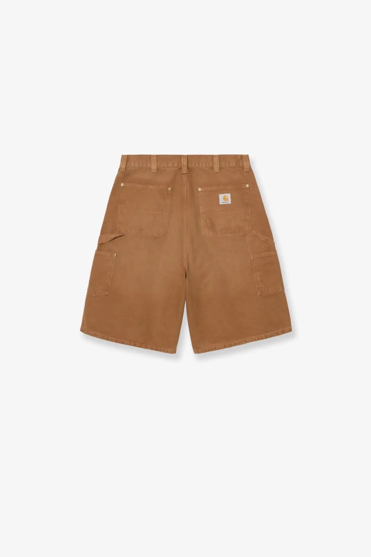 Back view of tan carhartt wip men’s organic cotton work shorts with multiple pockets and branded patch on waistband