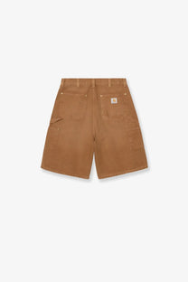 Back view of tan carhartt wip men’s organic cotton work shorts with multiple pockets and branded patch on waistband