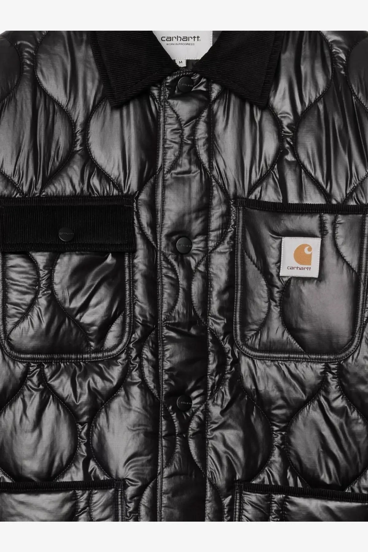 Black quilted carhartt wip men’s oscar chore liner nylon jacket with glossy finish and black corduroy collar