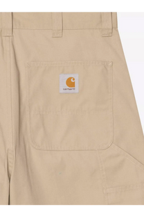 Carhartt wip men’s postal dk cotton blend bermuda shorts in beige with a white patch and orange logo on front pocket
