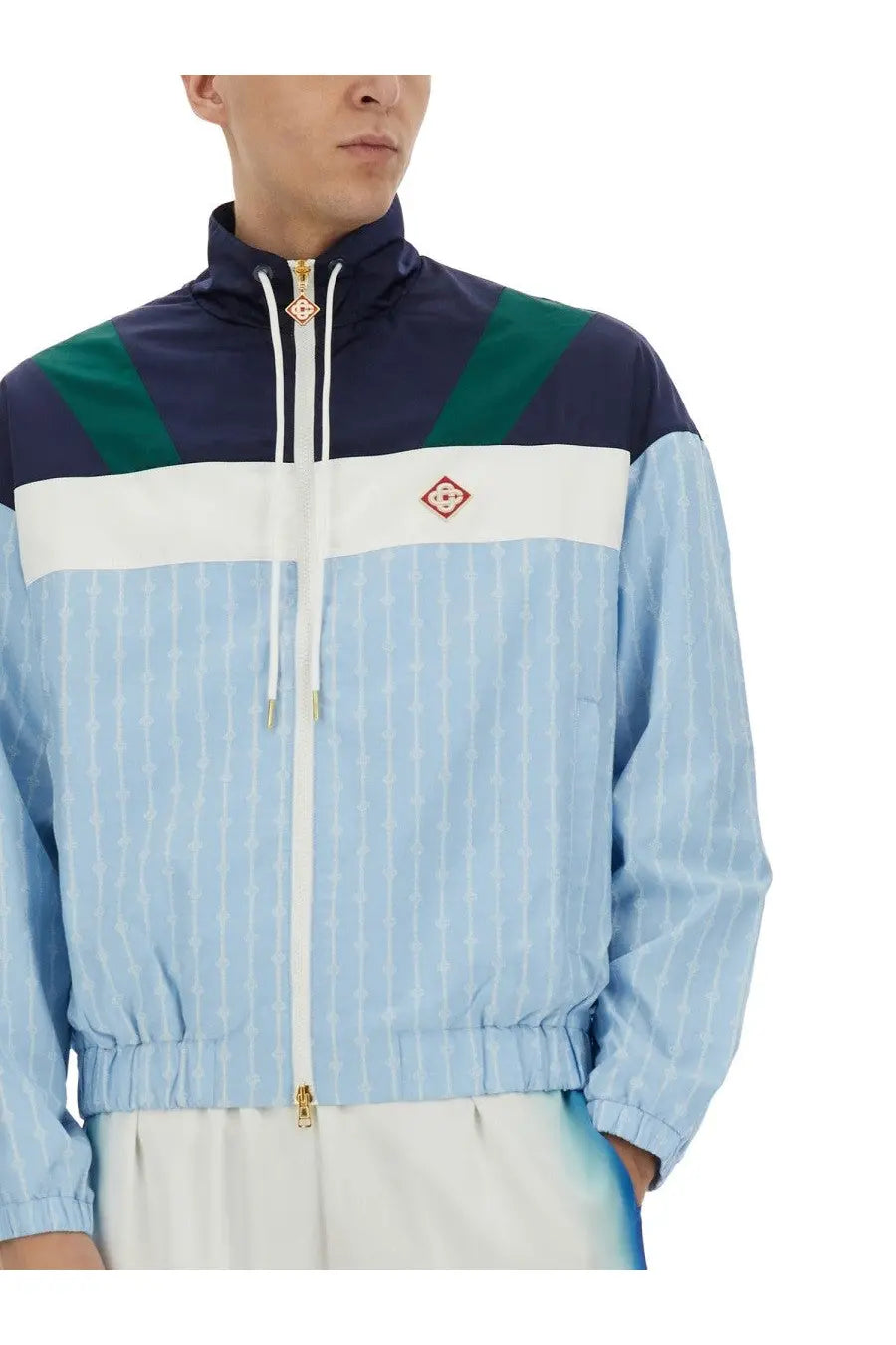 Casablanca men’s pinstripe laurel track jacket in navy blue green and light blue color-block with white stripe and red diamond logo