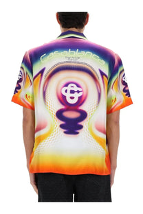 Back of a casablanca men’s printed shirt with psychedelic swirl design in purple orange yellow and white text