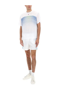 Casablanca men’s white short-sleeved shirt with gradient blue and green geometric pattern across the chest