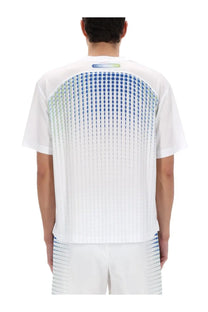 Back of casablanca men’s white short-sleeved shirt with gradient blue dot pattern vertical pleats and cosmic logo