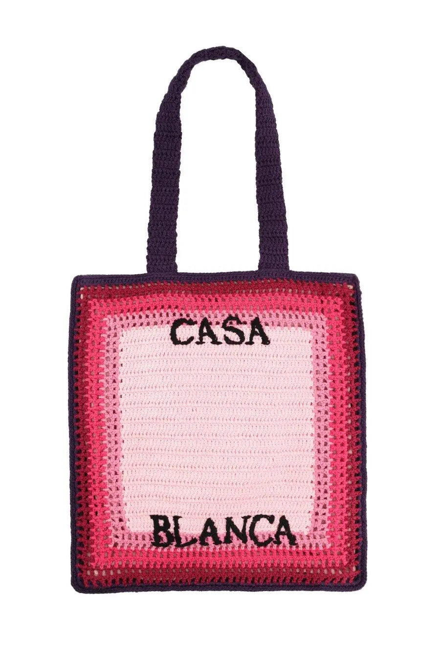 A vibrant pink and navy blue crocheted tote bag with black embroidered casa blanca lettering for men