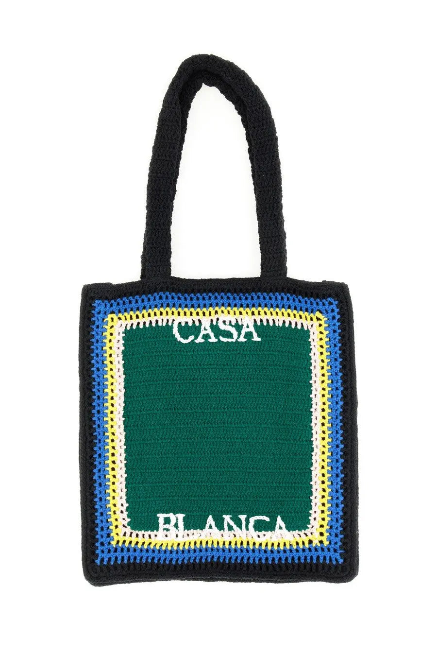 Black crocheted unisex tote bag with green center panel bordered by blue and yellow stripes and white casa blanca lettering