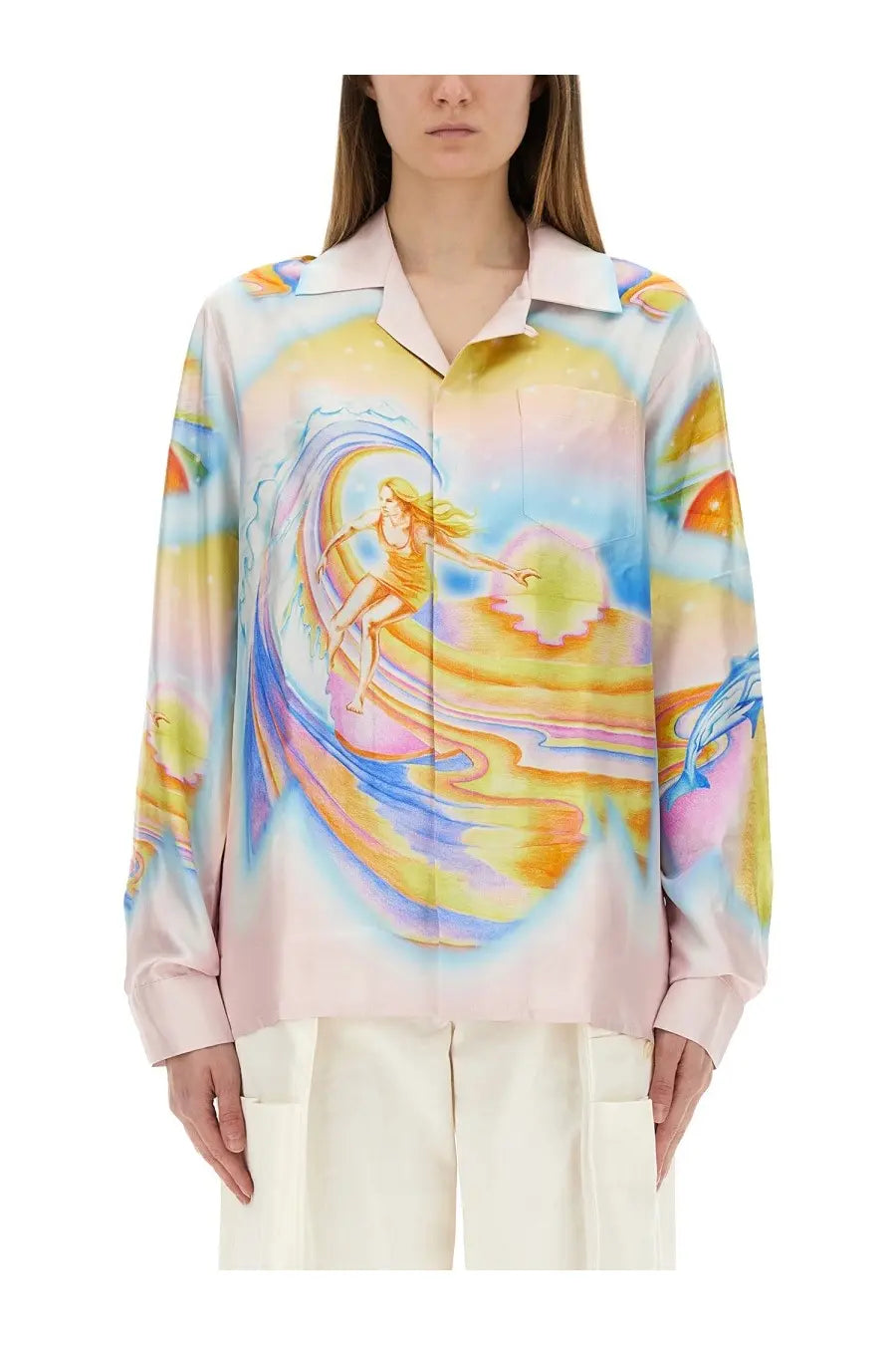 Pastel pink silk blouse with vibrant psychedelic surfer print featuring swirling rainbow waves and abstract ocean elements