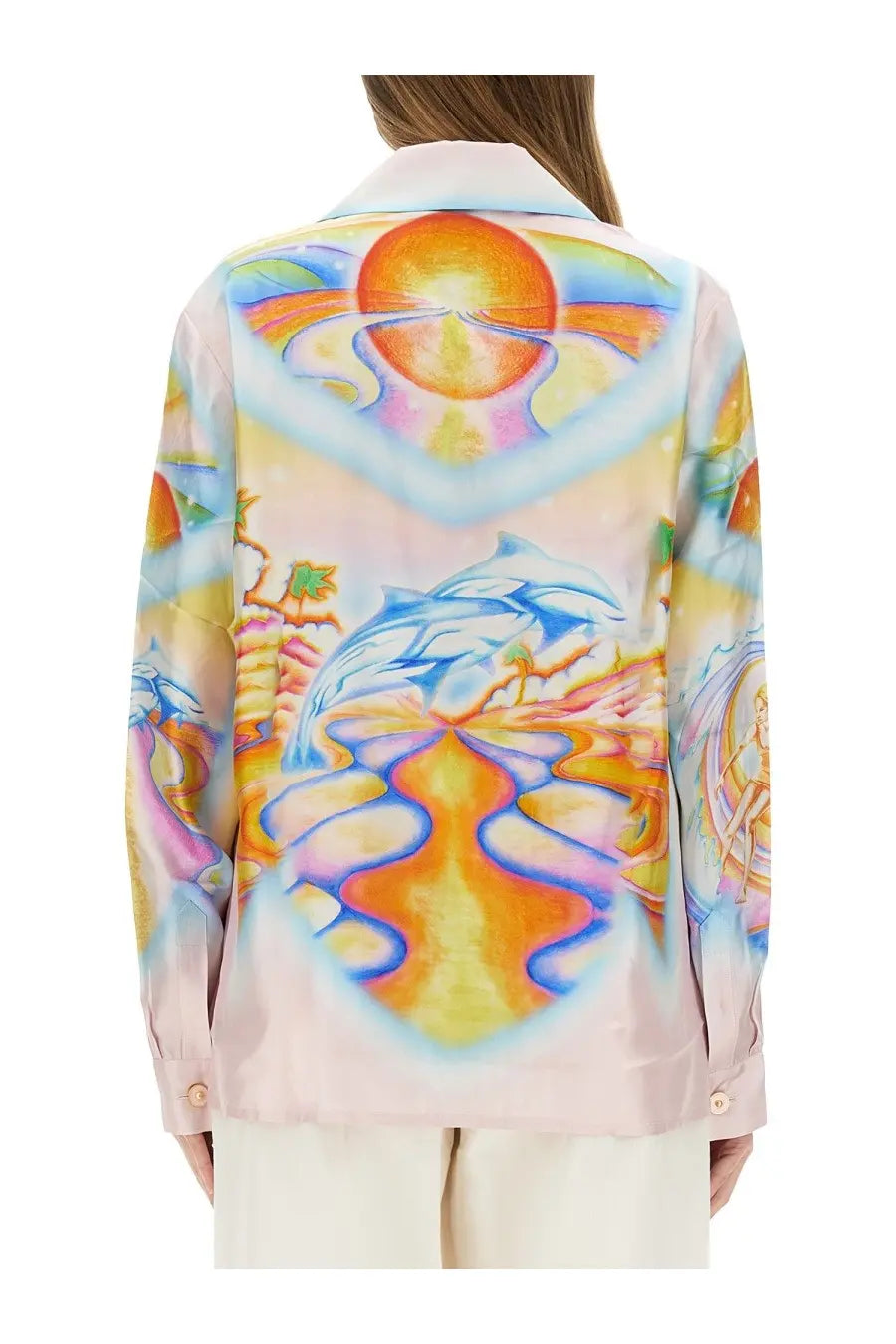 A vibrant long-sleeved silk shirt with psychedelic swirling colors and celestial motifs from Casablanca women