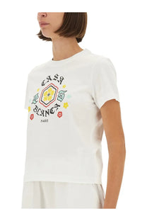 White cotton t-shirt with colorful floral graphic and casa blanca paris text in black script for women