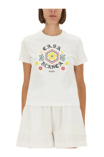 White short-sleeved cotton t-shirt with colorful casa blanca paris floral graphic print for women