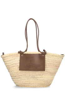 Castañer women’s beige woven straw tote bag with brown leather handles and embossed cayman leather patch