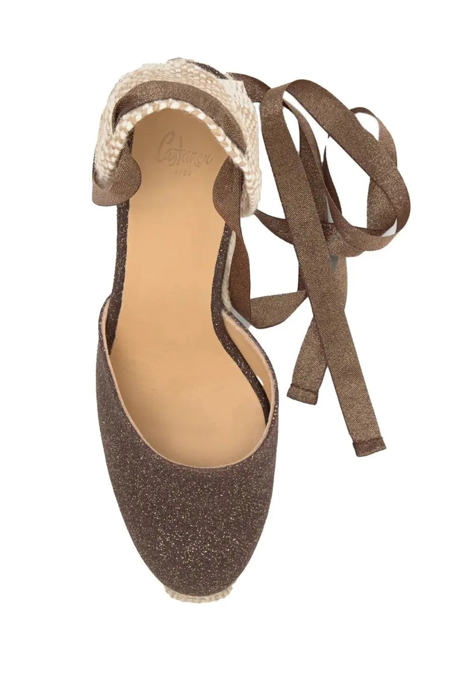 Brown glittery espadrille wedge shoe with woven jute trim and matching ribbon ties from castañer women’s espadrilla carina con zeppa
