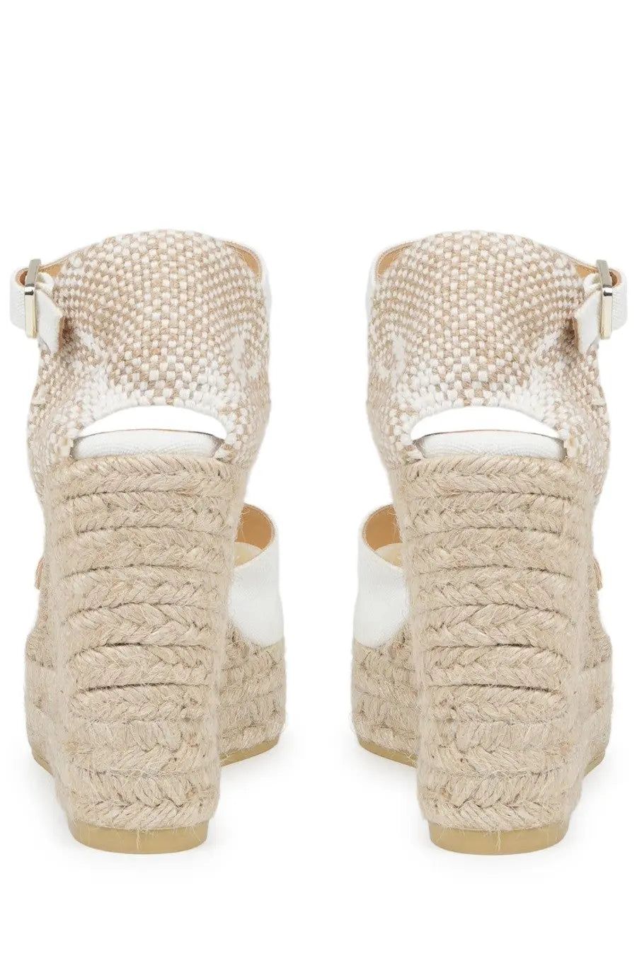 Beige woven espadrille wedge sandals with white leather ankle straps and buckles by castañer women’s espadrilla chiarita con zeppa white
