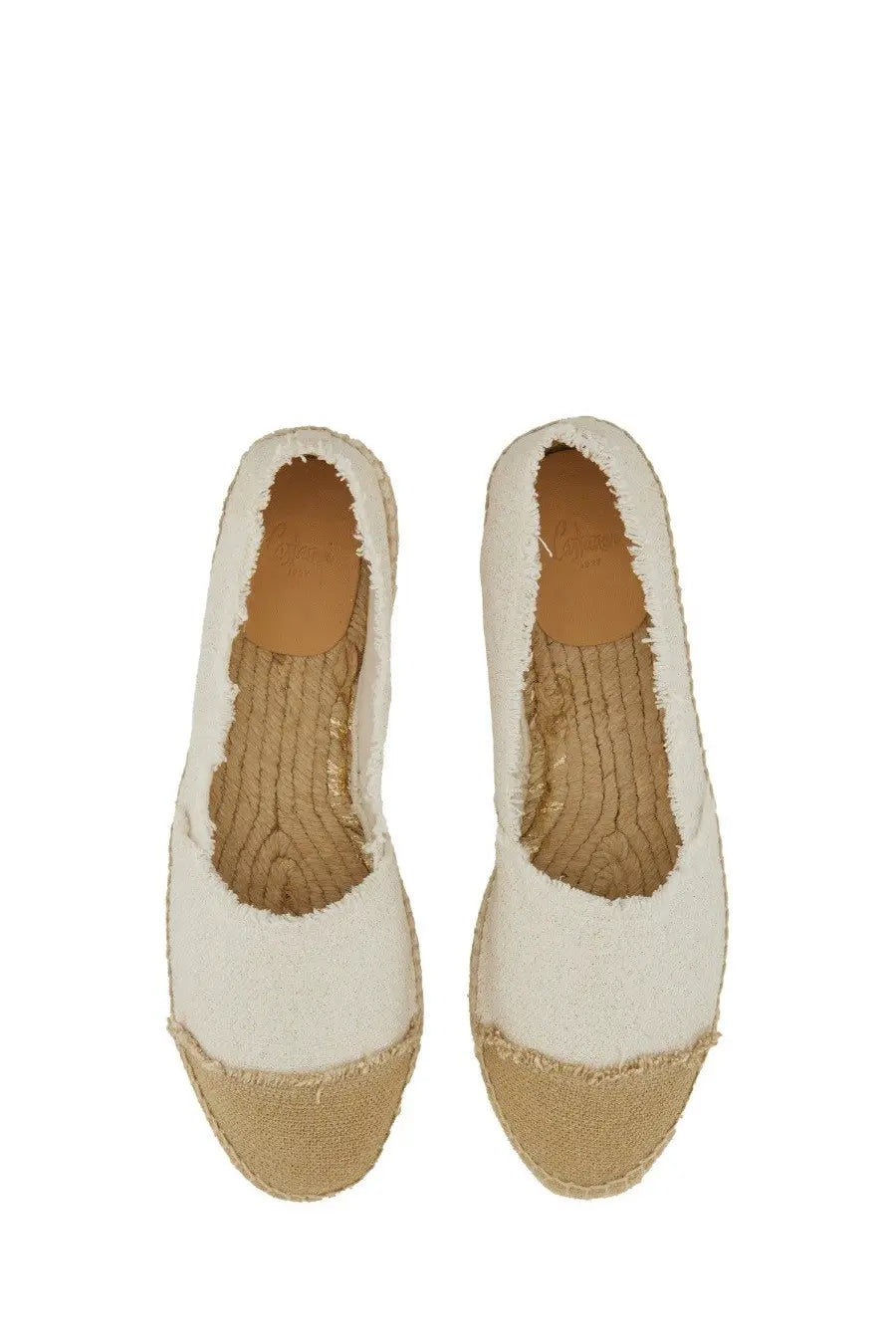 Cream-colored Castañer women’s espadrilla Kampala flats with frayed canvas upper and woven jute sole