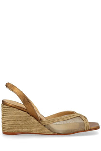 Castañer women’s gold espadrille wedge sandal with woven rope heel and sheer mesh straps front view