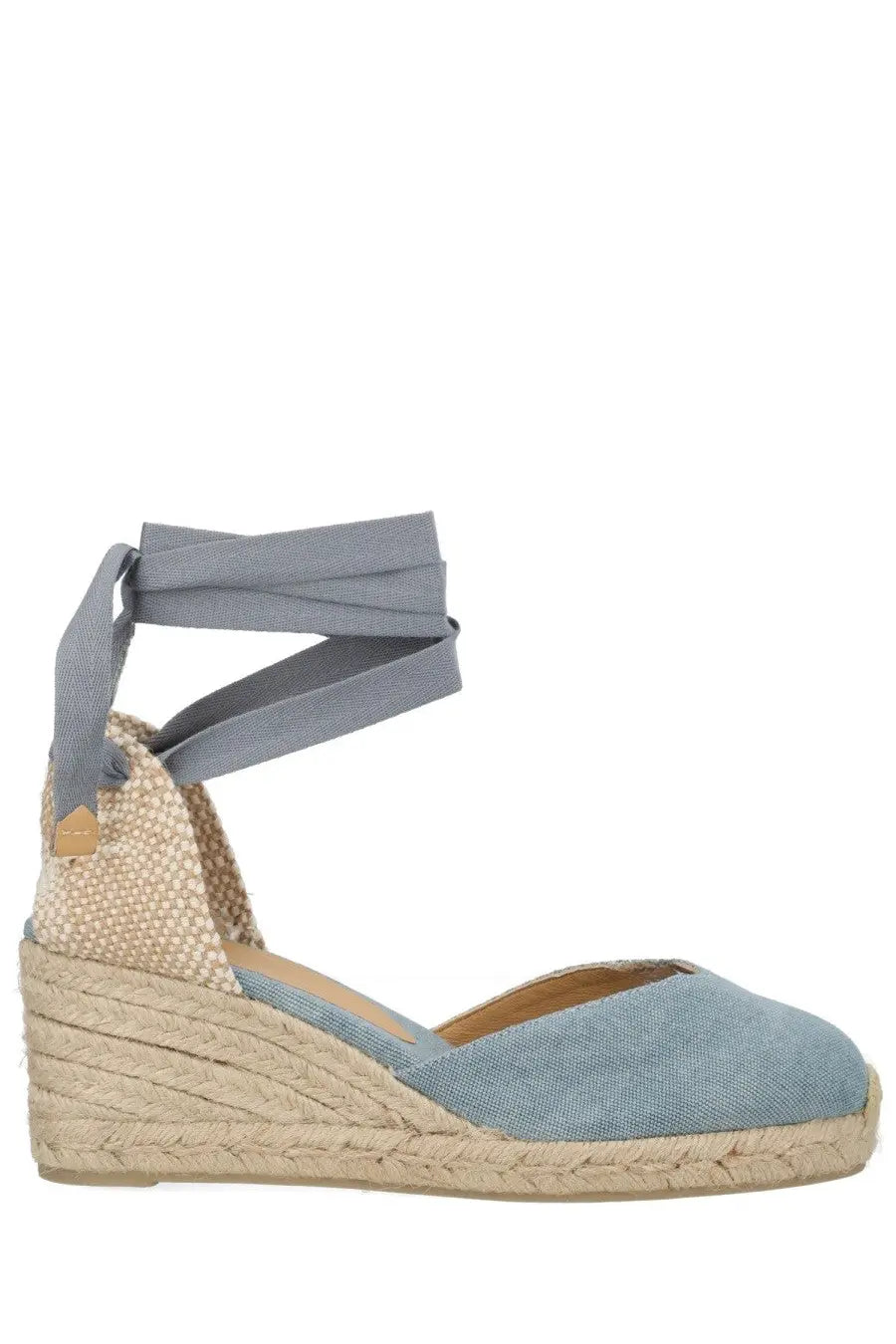Castañer women’s espadrille wedge sandal in light blue denim with woven jute sole and gray ribbon ankle strap