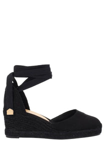 Black espadrille wedge sandal by castañer with woven rope sole and adjustable ankle strap for women