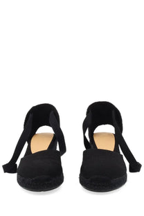 Castañer women’s espadrille cute black wedge sandals with woven jute sole and soft fabric upper visible from front
