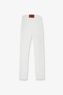 Celine men’s boyfriend white cotton trousers with straight legs and brown leather patch at the waistband back view