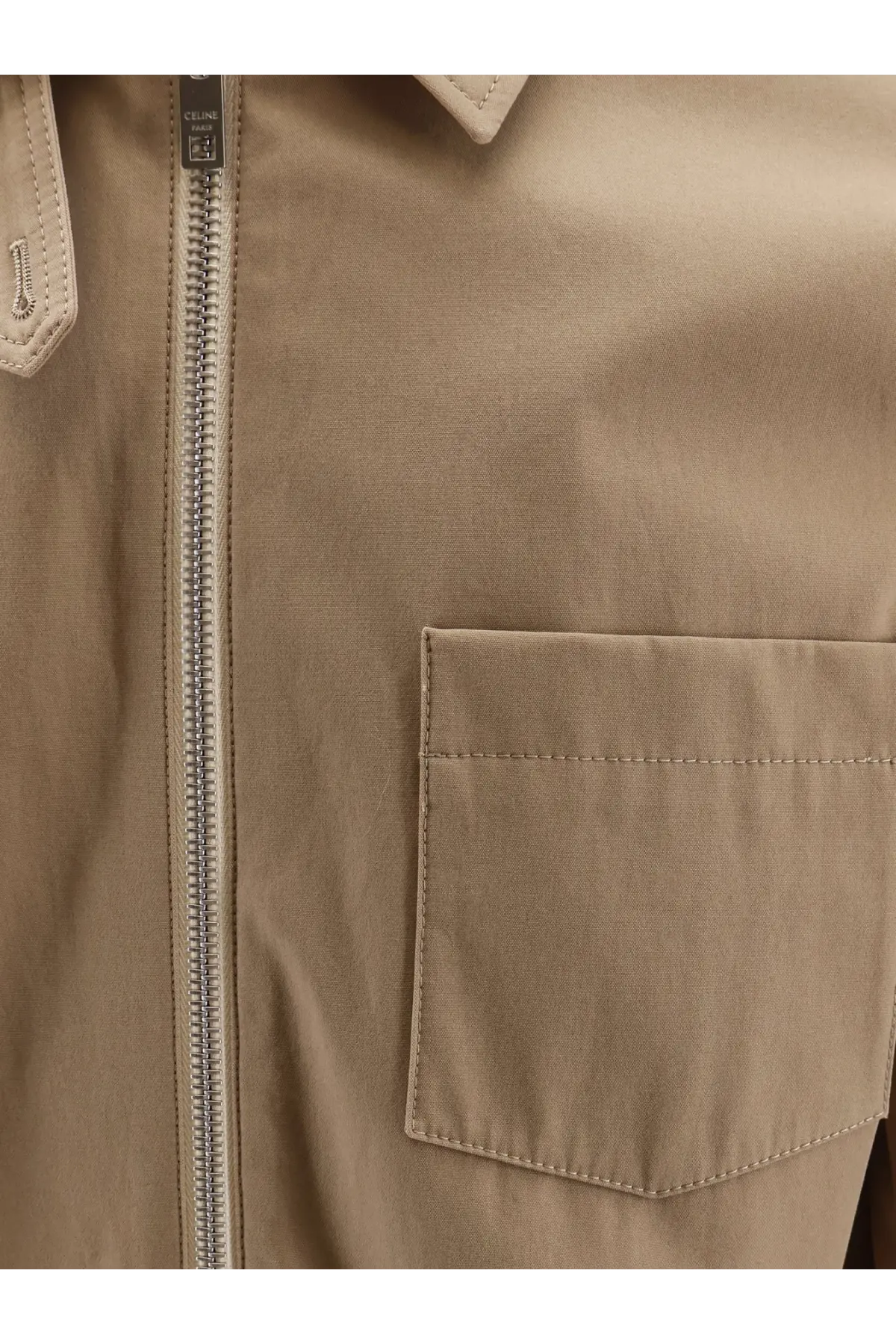 Beige celine men’s cotton trench coat with silver zipper and matching pocket featuring subtle stitching details