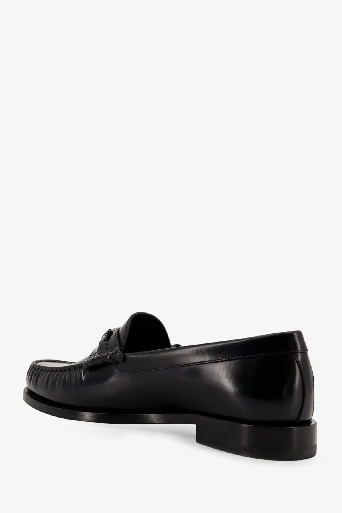 Black leather Celine men’s Luco loafers with polished finish and decorative tassel at the front